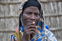 An elderly woman from Daifa village, located six kilometres from Jowhar in Middle Shabelle region witnesses the hand over to her community, of 16 shallow wells fitted with hand pumps on 15 October 2018.