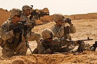 U.S. Soldiers with Alpha Company, 1st Battalion, 17th Infantry Regiment engage enemy forces in a small arms fire fight with insurgents during Operation Mostarak in Badula Qulp, Helmand province, Afghanistan, Feb. 19, 2010.