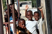 Haitians wave to MarinesChildren from Mirebalais, Haiti bid Marines farewell near soccer field the Marines used as a landing zone. A 10-man team entered the town to assess the need for immediate disaster relief. Original public domain image from Flickr