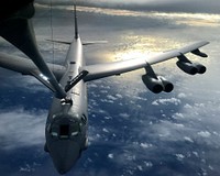 A U.S. Air Force KC-135 Stratotanker, assigned to the 506th Expeditionary Air Refueling Squadron, refuels a B-52 Stratofortress over the Indian Ocean June 10, 2018.