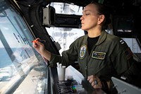 U.S. Navy Lt. Leah Blaine charts flight deck activity in primary flight control during flight operations aboard the Wasp-class amphibious assault ship USS Kearsarge (LHD3) during the Carrier Strike Group FOUR (CSG 4) Amphibious Ready Group (ARG), Marine Expeditionary Unit (MEU) Exercise in the Atlantic Ocean Sept. 4, 2018.