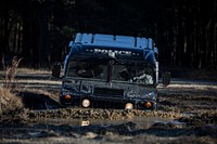 A Humvee from the Rutherford Police Department is driven on the tactical driver's course on Joint Base McGuire-Dix-Lakehurst, N.J., Dec. 18, 2018.