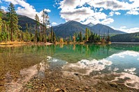 In the heart of the Rocky Mountains, west of the continental divide and just south of the Canadian border, lies the 2.4 million acre Flathead National Forest in Montana.