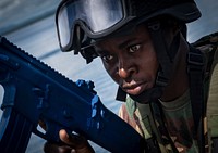 PEMBA, Mozambique (Feb. 4, 2019) A military member from the Tanzania People's Defence Force boards the Mauritius Kora-class Corvette CGS Barracuda (CG 31) during a visit, board, search and seizure drill while participating in exercise Cutlass Express 2019 in Pemba, Mozambique, Feb. 5, 2019.