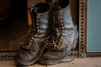 The worn boots of a smokejumper dries out at the U.S. Department of Agriculture Forest Service Smokejumper Base/ SEAT Base/ Helitack Base at the McCall Municipal Airport, in McCall, Idaho, on Friday, July 26, 2013.