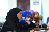 A participant speaks during an awareness event on the Constitutional Review Process organised by the Protection, Human Rights and Gender Unit of the African Union Mission in Somalia (AMISOM).