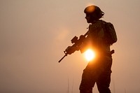 A special warfare airman with the New Jersey Air National Guard’s 227th Air Support Operations Squadron moves tactically at sunset on Joint Base McGuire-Dix-Lakehurst, N.J., May 31, 2019.