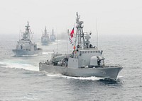 Chilean Navy fast attack crafts Teniente Serrano (LM 38), Teniente Orella (LM 37) and Teniente Uribe (LM 39), and patrol craft Guadiamarina Riquelme (LM 36) move into formation behind the USS Klakring (FFG 42) off the coast of Iquique, Chile, June 19, 2010.