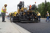 Civilian and active-duty Airmen assigned to the 773d Civil Engineer Squadron perform roadway maintenance, repaving, and replacement of concrete pads on the runway areas on Joint Base Elmendorf-Richardson, Alaska, Aug. 1, 2019. Civil engineer Airmen keep military facilities, utilities, roadways and runways in peak condition to support the diverse and challenging missions demanded of America's Air Force every day. (U.S. Air Force photo/Justin Connaher). Original public domain image from Flickr