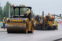 Civilian and active-duty Airmen assigned to the 773d Civil Engineer Squadron perform roadway maintenance, repaving, and replacement of concrete pads on the runway areas on Joint Base Elmendorf-Richardson, Alaska, Aug. 1, 2019. Civil engineer Airmen keep military facilities, utilities, roadways and runways in peak condition to support the diverse and challenging missions demanded of America's Air Force every day. (U.S. Air Force photo/Justin Connaher). Original public domain image from Flickr