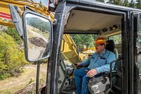 U.S. Forest Service Road Crew Supervisor J.S. Turner excavates a closed bridge to create a crossing for locals near the Maidenrock area on Wisdom Ranger District of Beaverhead-Deerlodge National Forest Montana, September 15, 2019.