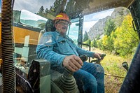 U.S. Forest Service Road Crew Supervisor J.S. Turner excavates a closed bridge to create a crossing for locals near the Maidenrock area on Wisdom Ranger District of Beaverhead-Deerlodge National Forest Montana, September 15, 2019.