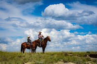 Rancher Travis Brown manages the rangeland with his kids in mind. Photo taken June 19, 2019 at the LO Cattle Company located in Sand Springs, MT in Garfield County. Original public domain image from Flickr