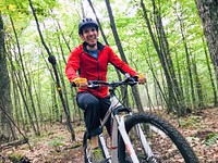 Dave de Vinck mountain bikes through the wilderness of the Adirondacks in northeastern New York, on Sept. 14, 2019. Courtesy photo by Emily de Vinck. Original public domain image from Flickr