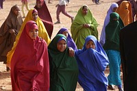 Residents of Baidoa flock to Dr. Ayub stadium for Eid ul-Fitri prayers to mark the end of the holy month of Ramadan in Baidoa, Somalia on June 4, 2019. AMISOM Photo. Original public domain image from Flickr