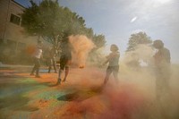 People throwing color powder. Original public domain image from Flickr