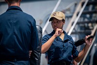 ATLANTIC OCEAN (July 25, 2019) — Operations Specialist Seaman Gabreale M. Simmons-Benton, a Sailor assigned to the Arleigh Burke-class guided-missile destroyer USS Porter (DDG 78), trains during a non-lethal weapons qualification on the ship’s flight deck in the Atlantic Ocean July 25, 2019.