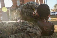 191204-M-YD783-1024 U.S. Navy Hospital Corpsman 3rd Class Washington Le, a corpsman with Combat Logistics Battalion 22, checks the breathing of Private First Class Joe Stone, an administrative specialist with the 22nd Marine Expeditionary Unit, during Tactical Combat Casualty Care training aboard Camp Lejeune, N.C., Dec. 5, 2019.