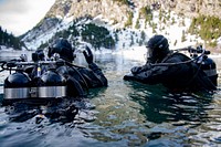 PANTICOSA, Spain (Feb. 7, 2020) Explosive Ordnance Disposal Technicians, from Explosive Ordnance Disposal Mobile Unit 8 (EODMU 8), assigned to Navy Expeditionary Combat Force Europe-Africa/Task Force (CTF) 68, conduct in-water safety checks as part of annual bi-lateral altitude and ice dive training in the Pyrenees Mountains with dives from the Spanish Navy Center for Diving (Centro de Buceo de la Armada, CBA) Feb. 7, 2020.