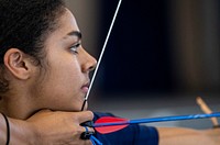 200219-N-NU281-1041 PEARL HARBOR (Feb. 21, 2020) PEARL HARBOR (Feb. 21, 2020) Hospitalman Kayla Williams participates in an archery training competition during the Navy Wounded Warrior program introductory sports camp.