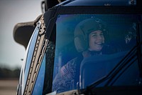 U.S. Army 1st Lt. Larissa Fluegel sits for a portrait before a flight at the Army Aviation Support Facility on Joint Base McGuire-Dix-Lakehurst, N.J., March 5, 2020.