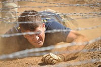 U.S. Navy Chief Petty Officer Gabriel Paine, assigned to Commander, Submarine Force U.S. Pacific Fleet, competes in the annual Chief Selectee Fleet Marine Force (FMF) Challenge at the Marine Corps obstacle course on Kaneohe Marine Corps Base in Hawaii Sept. 2, 2010.