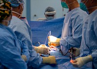 200409-N-PH222-1132 LOS ANGELES (April 9, 2020) Sailors perform a surgery in an operating room aboard the hospital ship USNS Mercy (T-AH 19).