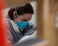 Sailor Checks Patient’s Vitals 200414-N-LW757-1024 LOS ANGELES (April 14, 2020) Lt. Kristen Van Meter, from Bangor, Maine, checks a patient’s vitals aboard the hospital ship USNS Mercy (T-AH 19) April 14.