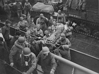Normandy. [Litters. Transport of sick and wounded.] [Boats.] [World War 2. European Theater.] [Scene.] WWII (European Theater). BuAer 231375 circa June 1944. Original public domain image from Flickr