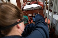 ATLANTIC OCEAN (Dec. 4, 2019) – Gas Turbine Systems Technician (Mechanical) Fireman Heather Evans takes a sample of fuel during an engineering evolution aboard the Arleigh Burke-class guided-missile destroyer USS Ross (DDG 71), Dec. 4, 2019.