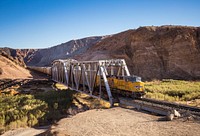 Train crossing a dry Mojave river. Original public domain image from Flickr