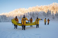 JBER fire protection specialists certify as ice rescue techniciansU.S. Air Force fire protection specialists with the 673d Civil Engineer Squadron leave a frozen lake after completing the practical skills portion of ice rescue training at Six Mile Lake on Joint Base Elmendorf-Richardson, Alaska, Jan. 11, 2020. The training, conducted in minus 15 degree Fahrenheit weather, taught the JBER firefighters the knowledge and skills necessary for safe rescue and recovery operations in, on and around ice and cold water. After completion of a classroom session, practical skills evaluation and a written examination the fire protection specialists were certified as ice rescue technicians. (U.S. Air Force photo by Alejandro Peña). Original public domain image from Flickr