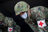 201029-M-AF005-1154 Japan Ground Self Defense Force Sgt. Daisuke Tabata, a medical sergeant with Medical Unit, 15th Logistics Unit, 15th Brigade, unloads medical equipment during exercise Keen Sword 21 on Marine Corps Air Station Futenma, Okinawa, Japan, Oct. 29, 2020.