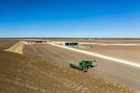 Schirmer Farms (Batesville) Operations Manager Brandon Schirmer leaves the harvester parked and ready to start the first sesame harvest of thiw 270-acre circular pivot irrigated sesame field at his mother and father's 1,014-acre multi-crop farm in Batesville, TX, on October 29, 2020.