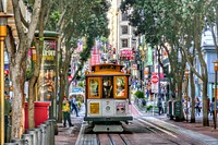 Historical cable car on Powell Street, San Francisco, California -xOctober 18, 2017. The route connects from Market Street through Union Square, North Beach, Nob Hill, Russian Hill and ends at Fisherman's Wharf. Original public domain image from Flickr