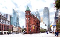 The Gooderham Building, also known as the Flatiron Building, is an historic office building at 49 Wellington Street East in Toronto, Ontario, Canada. It is located on the eastern edge of the city's Financial District (east of Yonge Street) in the St. Lawrence neighbourhood, wedged between Front Street and Wellington Street in Downtown Toronto, where they join up to form a triangular intersection. Completed in 1882, the red-brick edifice was an early example of a prominent flatiron building.The Gooderham Building is the focal point of one of Toronto's most iconic vistas: looking west down Front Street towards the building's prominent rounded corner, framed on the sides by the heritage commercial blocks along Front Street, and with the skyscrapers of the Financial District towering in the background. The CN Tower is also visible from certain angles behind Brookfield Place. This vista frequently appears in imagery of the city. Original public domain image from Flickr