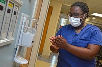 JACKSONVILLE, Fla. (Sept. 2, 2020) – Hospitalman Kyanna Harris uses hand sanitizer at Naval Hospital Jacksonville’s Intensive Care Unit. Harris, a native of Greenville, North Carolina, recently received a Culture of Patient Safety Award for her work with lab results in the ICU. “Working in the ICU has been a great experience for me.