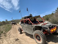 A group of off-highway vehicles drive by at the Pinnacles Staging Area. Original public domain image from Flickr