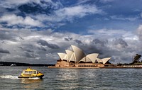 On Sydney Harbour,The Sydney Opera House is a multi-venue performing arts centre at Sydney Harbour located in Sydney, New South Wales, Australia. It is one of the 20th century's most famous and distinctive buildings. Original public domain image from Flickr