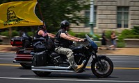 Motorcycle riders drive through the National Mall in Washington for the annual Rolling Thunder Memorial Day weekend observance