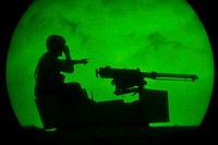 U.S. Army Sgt. Justin Goff, a scout from the 82nd Airborne Division, role plays as a member of an enemy force conducting simulated attacks on airborne Soldiers during a joint operational access exercise (JOAX) at Fort Bragg, N.C., June 26, 2011.