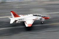 A U.S. Navy T-45C Goshawk training aircraft makes an arrested landing aboard the aircraft carrier USS Dwight D. Eisenhower (CVN 69), Sept. 19, 2011.