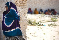 A woman stands inside a compound where Ugandan soldiers and doctors serving with the African Union Mission in Somalia (AMISOM) were providing free medical check-ups and treatment in the Kaaran district of the Somali capital Mogadishu.