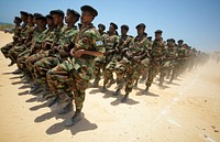 Somali National Army (SNA) soldiers parade 17 March 2012 as part of a passing-out ceremony marking the conclusion of a 10-week advanced training course conducted by the military component of the African Union Mission in Somalia (AMISOM).