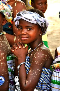 Ghana young women. Young women in ceremonial dress at a community health event sponsored by USAID. (USAID/Kasia McCormick) 2012. Original public domain image from Flickr