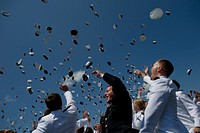 Graduating midshipmen toss their caps at the conclusion of the U.S. Naval Academy graduation and commissioning ceremony May 29, 2012, in Annapolis, Md. (DoD photo by Mass Communication Specialist 1st Class Chad J. McNeeley, U.S. Navy/Released). Original public domain image from Flickr