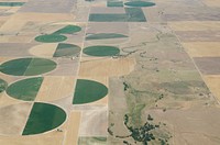 Aerial views of drought affected Colorado farm lands, 83 miles east of Denver, Colorado on Saturday, July 21, 2012. Green areas are irrigated, the yellow areas are dryland wheat crops. USDA photo by Lance Cheung. Original public domain image from Flickr