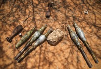Unexploded ordinance including rocket propelled grenades and mortar shells. Original public domain image from Flickr