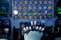 U.S. Air Force Capt. Benjamin Visser, a pilot with the 2nd Bomb Wing at Barksdale Air Force Base, La., adjusts the power on the eight engines of his B-52 Stratofortress aircraft while flying a mission during exercise Cope North 2013 near Andersen Air Force Base, Guam, Feb. 7, 2013.