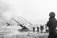 Israeli artillery fires on Syrian positions during the Arab-Israeli War on Oct. 12, 1973 - Bettman/CORBIS. From the booklet "President Nixon and the Role of Intelligence in the 1973 Arab-Israeli War." . Original public domain image from Flickr